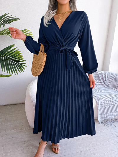 Aventura – Elegantes Plissee-Wickelkleid