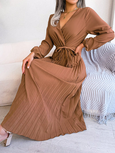 Aventura – Elegantes Plissee-Wickelkleid