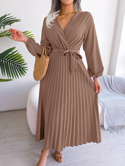 Aventura – Elegantes Plissee-Wickelkleid